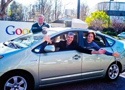 schmidt, page e brin con una google car